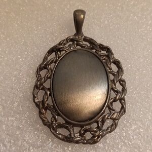 Elegant Silver Tone Pendant